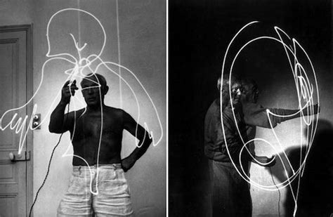 Artist Pablo Picasso Using Flashlight To Make Light Drawing In The Air