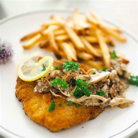 The Best Schnitzel With Mushroom Sauce Jägerschnitzel Dirndl Kitchen