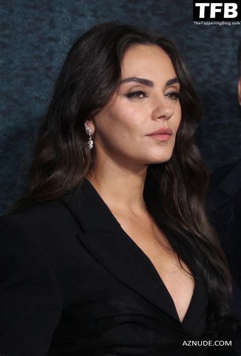 Mila Kunis Sexy Seen Flaunting Her Hot Cleavage On The Red Carpet At The Premiere Of Luckiest