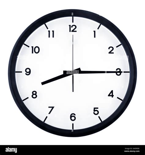 Classic analog clock pointing at eight fifteen o'clock, isolated on ...