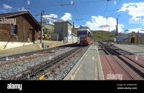 Gornergrat Cogwheel Train Arriving At Station Stock Video Footage Alamy