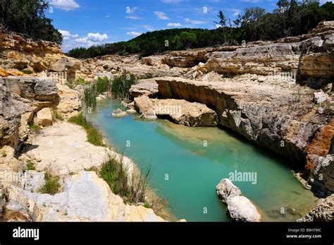 A Small Pond In The Limestone Of Texas Hill Country Usa Stock Photo