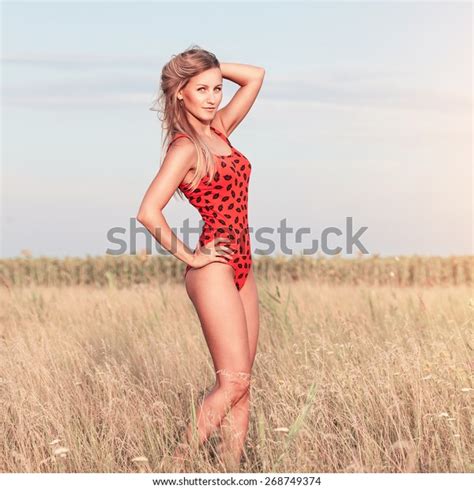 Sexy Relaxed Blonde Woman With Long Hair And Sensual Body Naked Legs And Perfect Ass Portrait