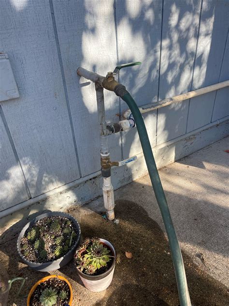 Water from spout has too much water pressure making hose come loose and