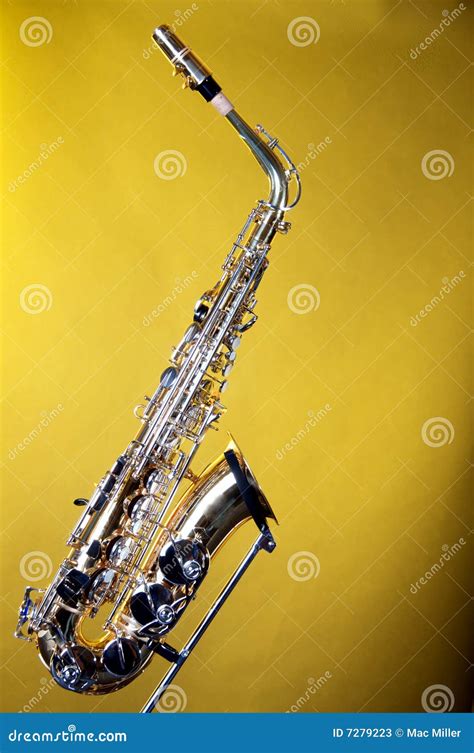 Alto Saxophone Isolated On Yellow Stock Photos - Image: 7279223