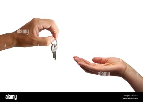 Handing Over The Keys Isolated On White Background Stock Photo Alamy