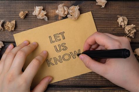 Premium Photo Cropped Hands Of Woman Holding Paper