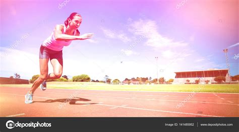 Female Athlete Running On Running Track — Stock Photo © Wavebreakmedia