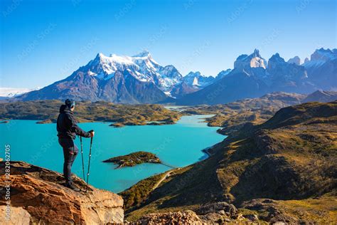 Fototapeta Hiker At Mirador Condor Enjoying Amazing View Of Los Cuernos