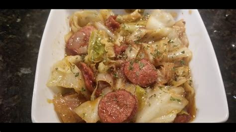 How To Make Fried Cabbage With Cajun Sausage And Bacon Youtube