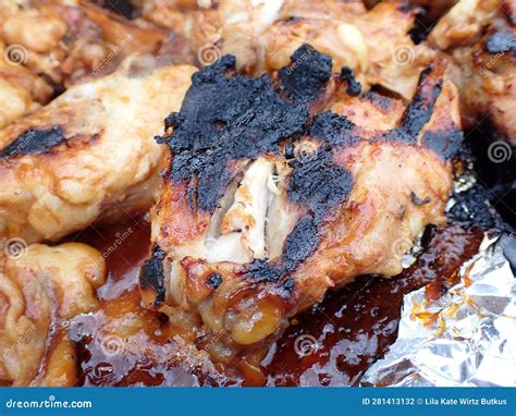 Barbecue Chicken Smothered In Bbq Sauce Cooking On The Grill