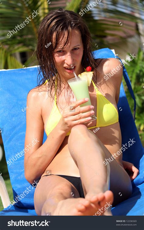 Bikini Girl Drinking Her Cocktail By Stock Photo 12236569 Shutterstock