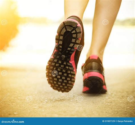 Runner Feet Running On Road Closeup On Shoes Royalty Free Stock Images ...