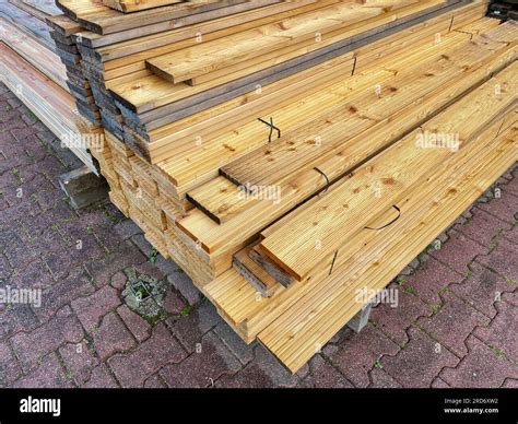 Lumber for house construction at a construction site Stock Photo - Alamy