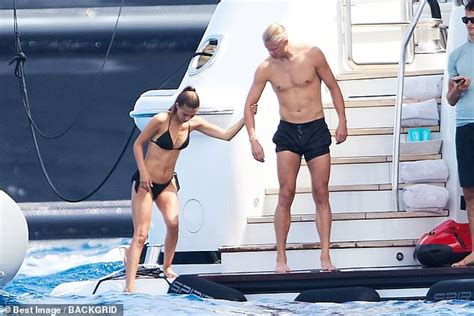 Erling Haaland Gets A Helping Hand With His Plait From His Bikini Clad