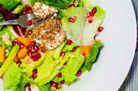 Persimmon And Pomegranate Salad With Pecan Coated Goat Cheese Nourish