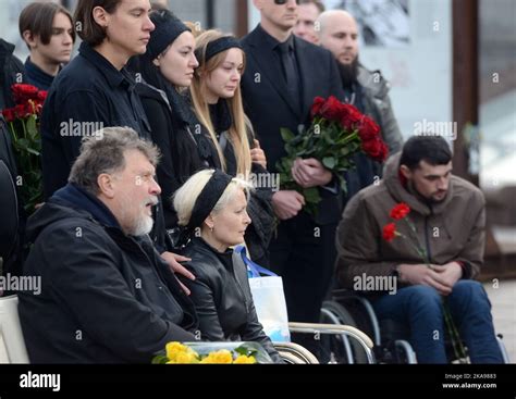 KYIV, UKRAINE - OCTOBER 29, 2022 - Relatives attend a lying-in-repose ...