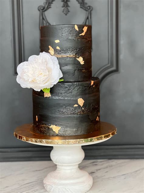 BLACK TWO TIERED NAKED CAKE WITH GOLD FLAKE COUTURE LINE