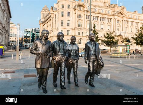 Bronze Statue Of The Four Liverpool Beatles Stands On Liverpool