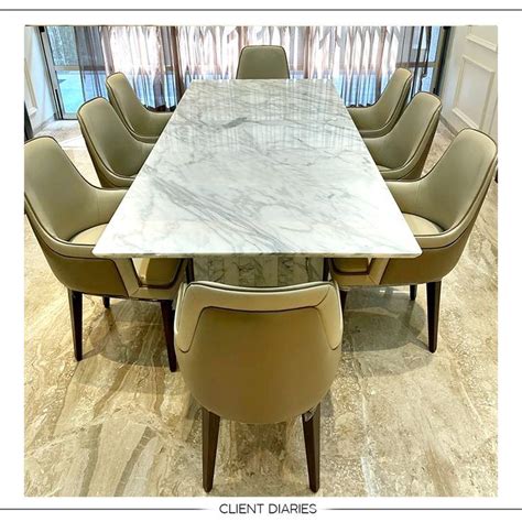 8 seater dining table with Italian marble top and wooden base gold finish