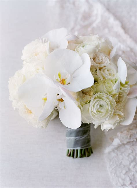 Elegant White Bouquet with Orchids and Roses