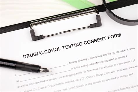 Premium Photo Drug And Alcohol Testing Consent Form On A Tablet Lies