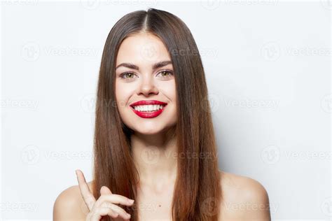 Brunette With Bare Shoulders Shows A Finger Up Charming Look Copy Space 22063687 Stock Photo At