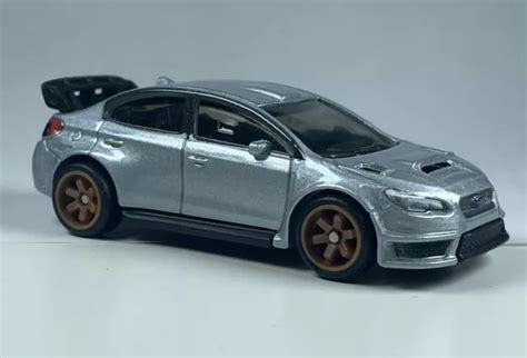 HOT WHEELS Subaru WRX STI Boulevard Premium Real Riders LOOSE MINT