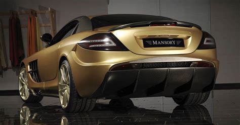 The Rear End Of A Gold Sports Car