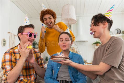 Make A Wish Woman Wearing Party Cap Blowing Out Burning Candles On Birthday Cake Happy