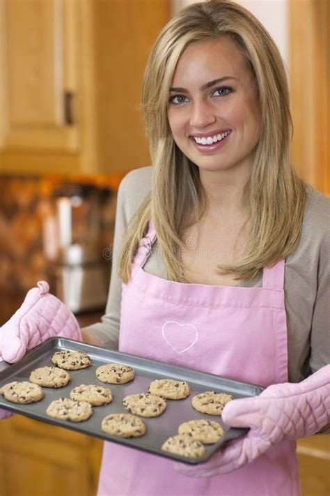 Young Woman Baking Chocolate Chip Cookies Royalty Free Stock Image