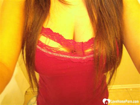 Babe Shows Off Sexy Curves At HomeMoviesTube