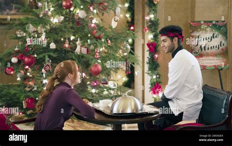 Hotel For The Holidays From Left Madelaine Petsch Mena Massoud 2022