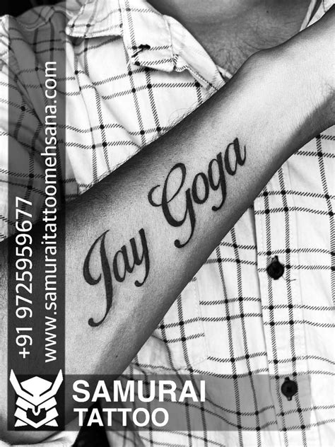 A Man With A Tattoo On His Arm That Says Jay Gogoa Samurai Tattoo