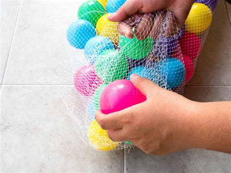 Getting Dirty Plastic Ball In A Net Bag Stock Image Image Of Plastic