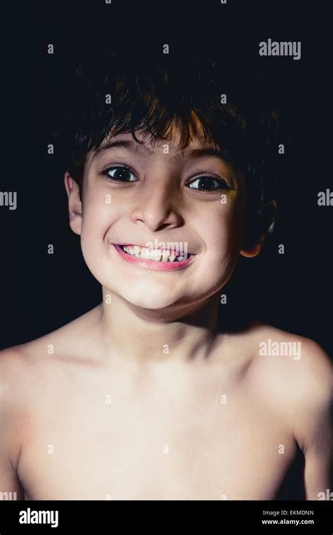 Smiling Boy In The Dark Toned Colorized Image Stock Photo Alamy