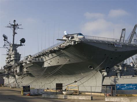 two large ships are parked next to each other