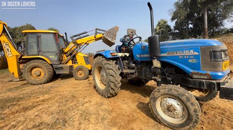 New Jcb Dx Backhoe Loading Mud In Powertrack Ds Plus And Sonalika