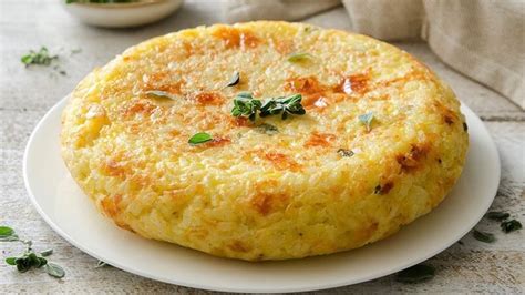 Prepara Una Rica Y Novedosa Tortilla De Arroz Con Queso En Minutos