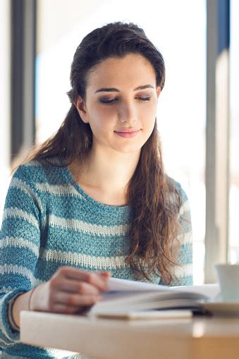 Beautiful Woman Reading A Book Stock Photo Download Image Now 2015