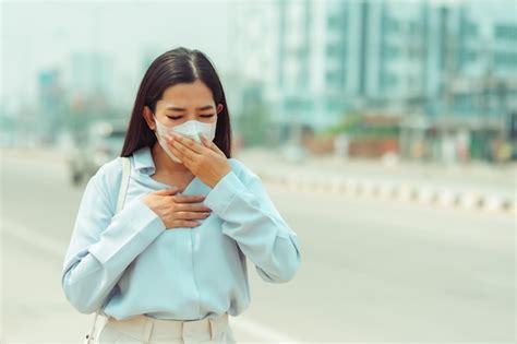 Premium Photo Asian Women Wearing Protection Mask Feels Headaches And