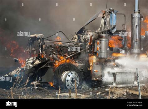 Close Up Of A Tractor Trailer Truck On Fire After An Automobile Accident United States Of