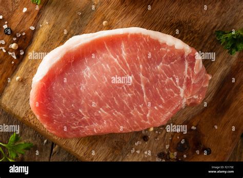 Raw Organic Boneless Pork Chops Ready To Cook Stock Photo Alamy