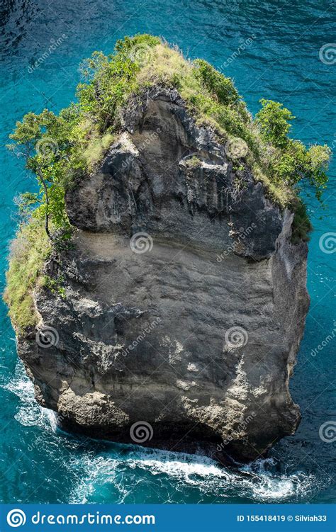 A Rock Formation Out Of The Ocean At Thousand Island Viewpoint In Nusa