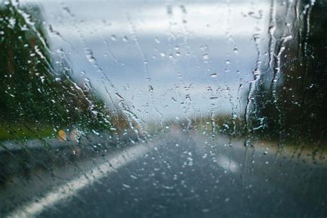 Driving in the rain stock image. Image of transportation - 17298277