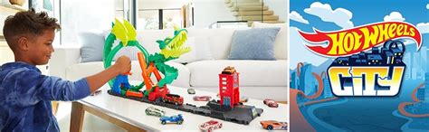 Amazon HOT WHEELS Track Set With 1 64 Scale Toy Firetruck City Fire Station With Dragon