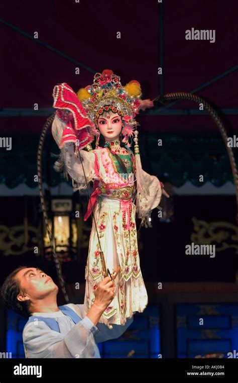 Female Puppet Puppeteer In A Traditional Chinese Puppet Show Chengdu