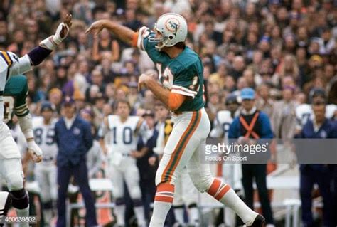 Bob Griese Of The Miami Dolphins Throws A Pass Against The Minnesota