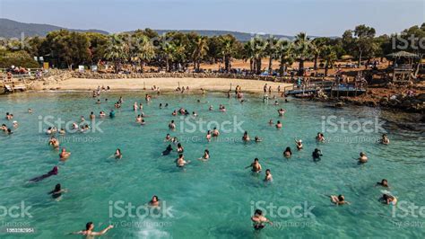 Aerial View Of People Swimming In The Sea Popular Island Crowd Of