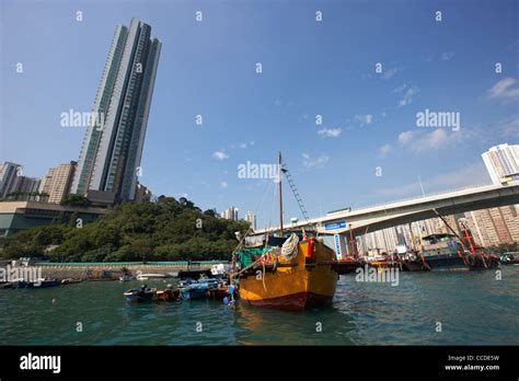 Large And Small Fishing Boats In Aberdeen Harbour Beneath The Ap Lei